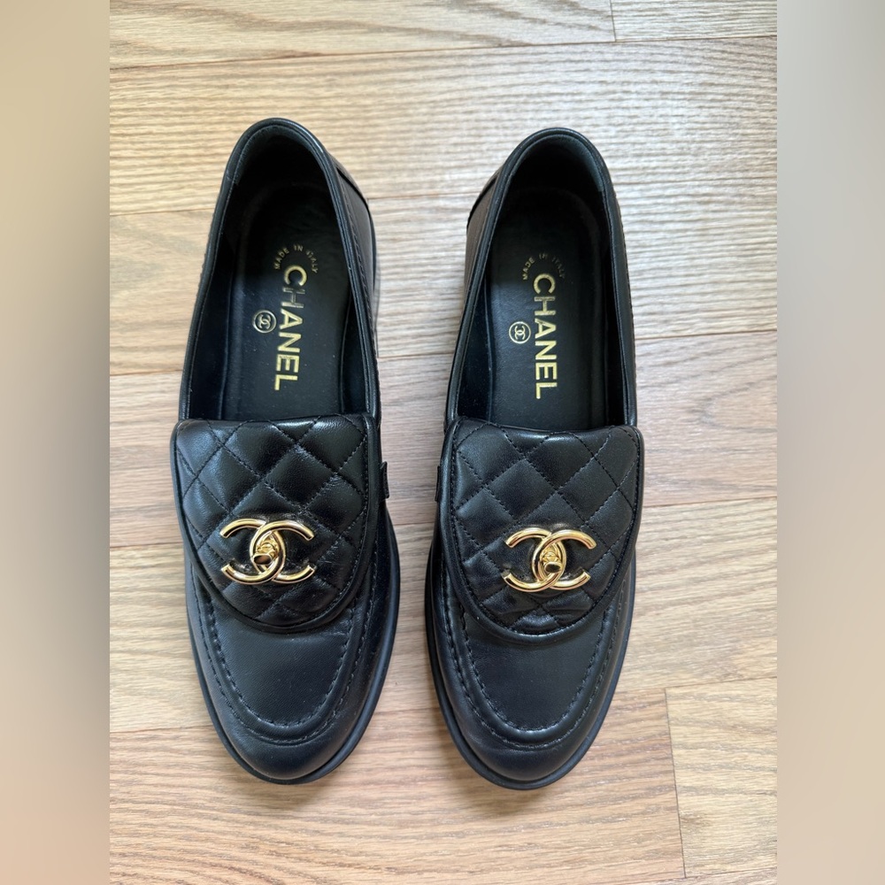 CHANEL Black and Gold Quilted Loafers